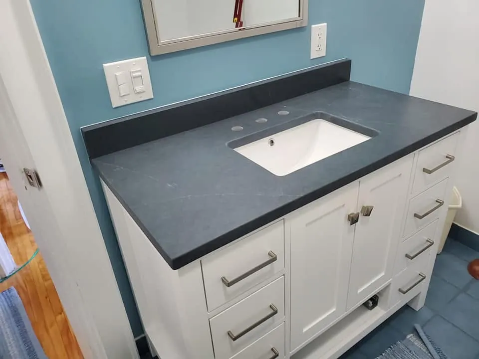 Bath · Dark stone vanity