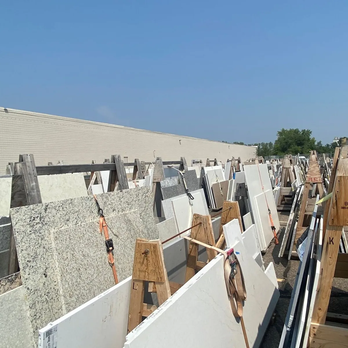Stone slab selection in the MJ's Countertops showroom in Burnsville, MN